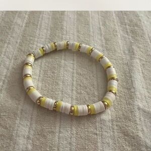 White & Yellow Beaded Bracelet with Gold Accents